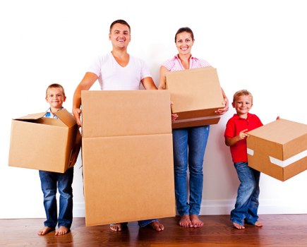 Removal van and packed boxes for a house move in Battersea