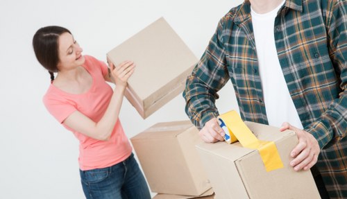 Moving team protecting furniture during a Battersea van and man service