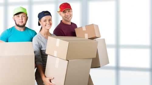 Removal team navigating access challenges in a Battersea apartment move