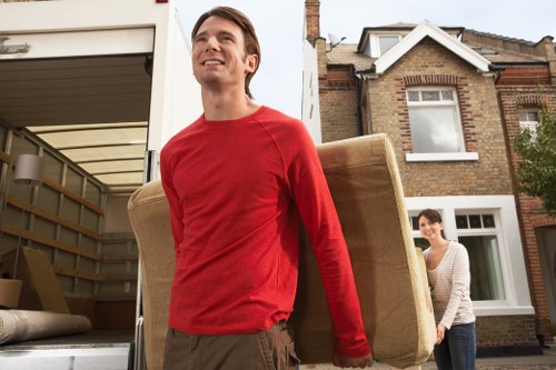 Local removals van ready for a Battersea move near residential buildings